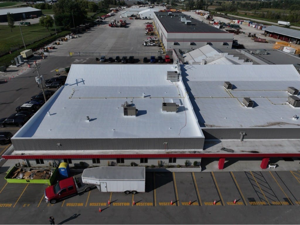 Membrane coating with affinity top coat industrial building