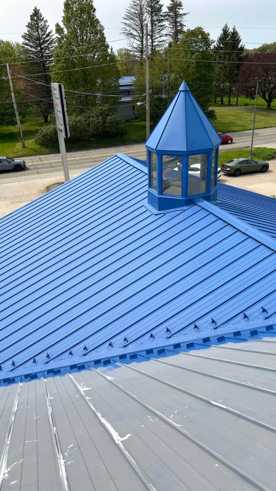 Metal roof restoration commercial building