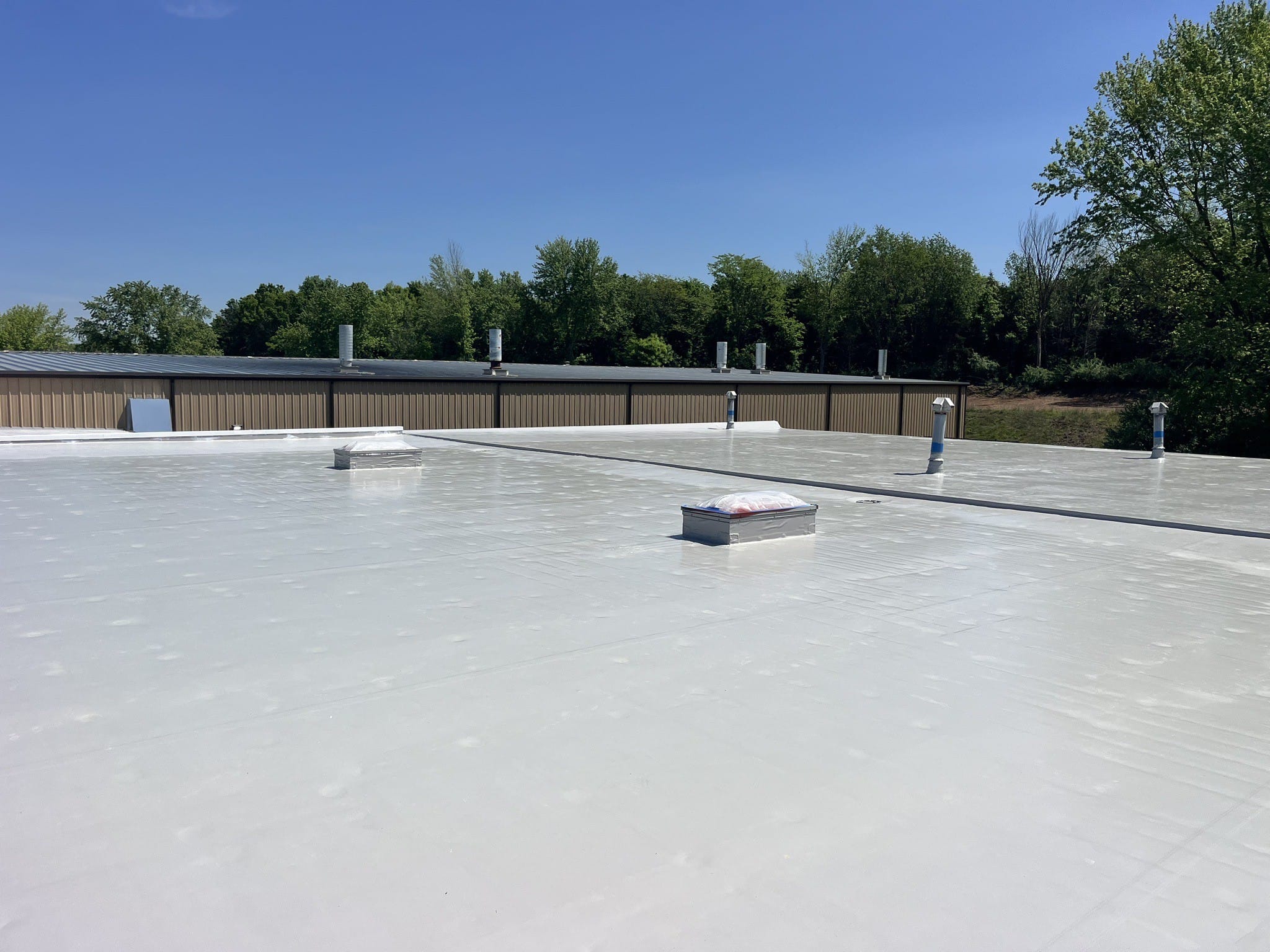 Membrane coating system industrial facility