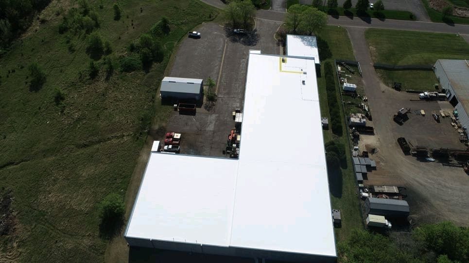 Membrane restoration with affinity top coat industrial facility