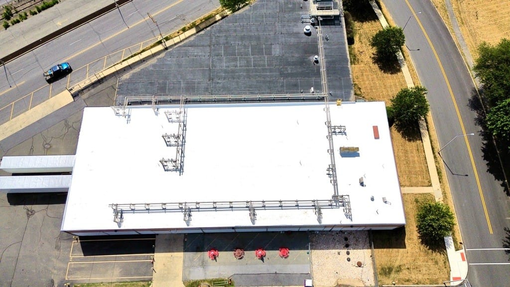 Single-ply membrane installation industrial building