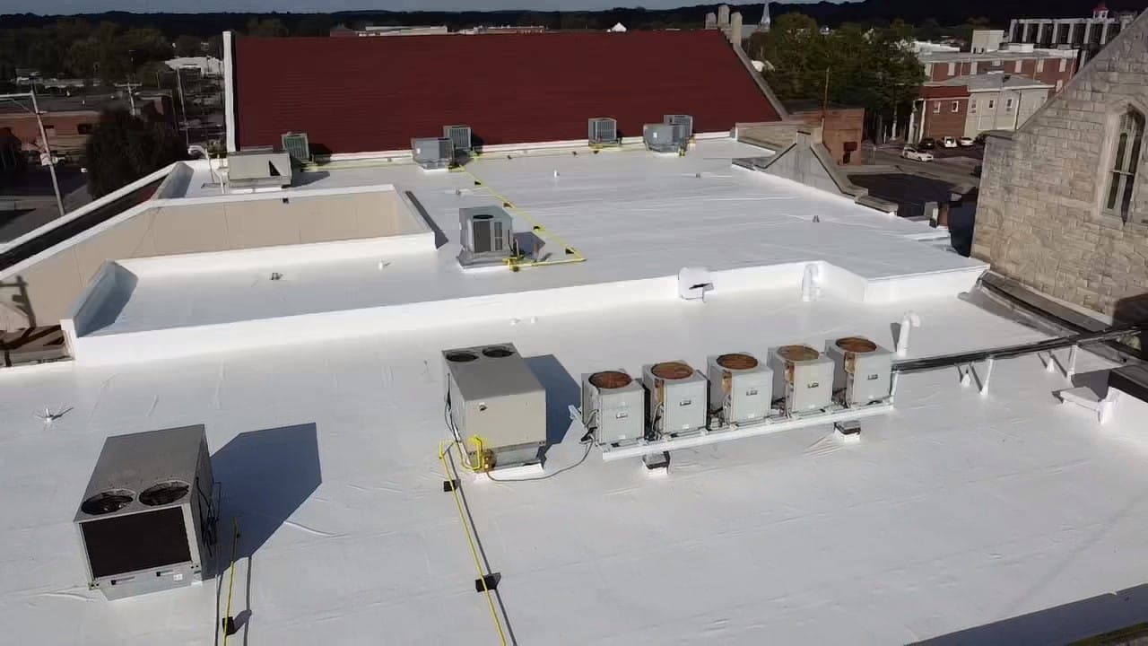 Membrane coating with affinity top coat industrial building