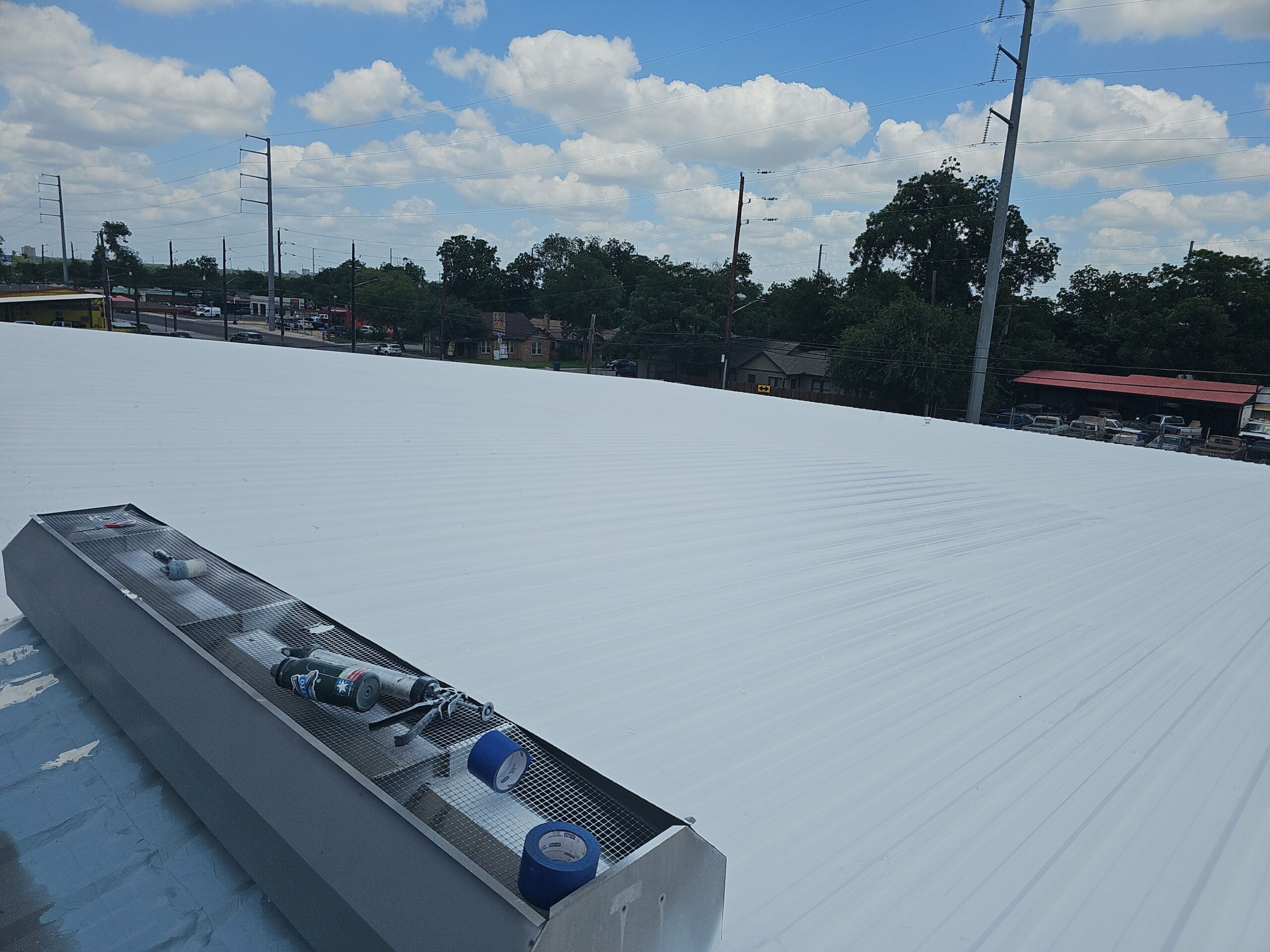 Houston retail center roof coating application for energy efficiency